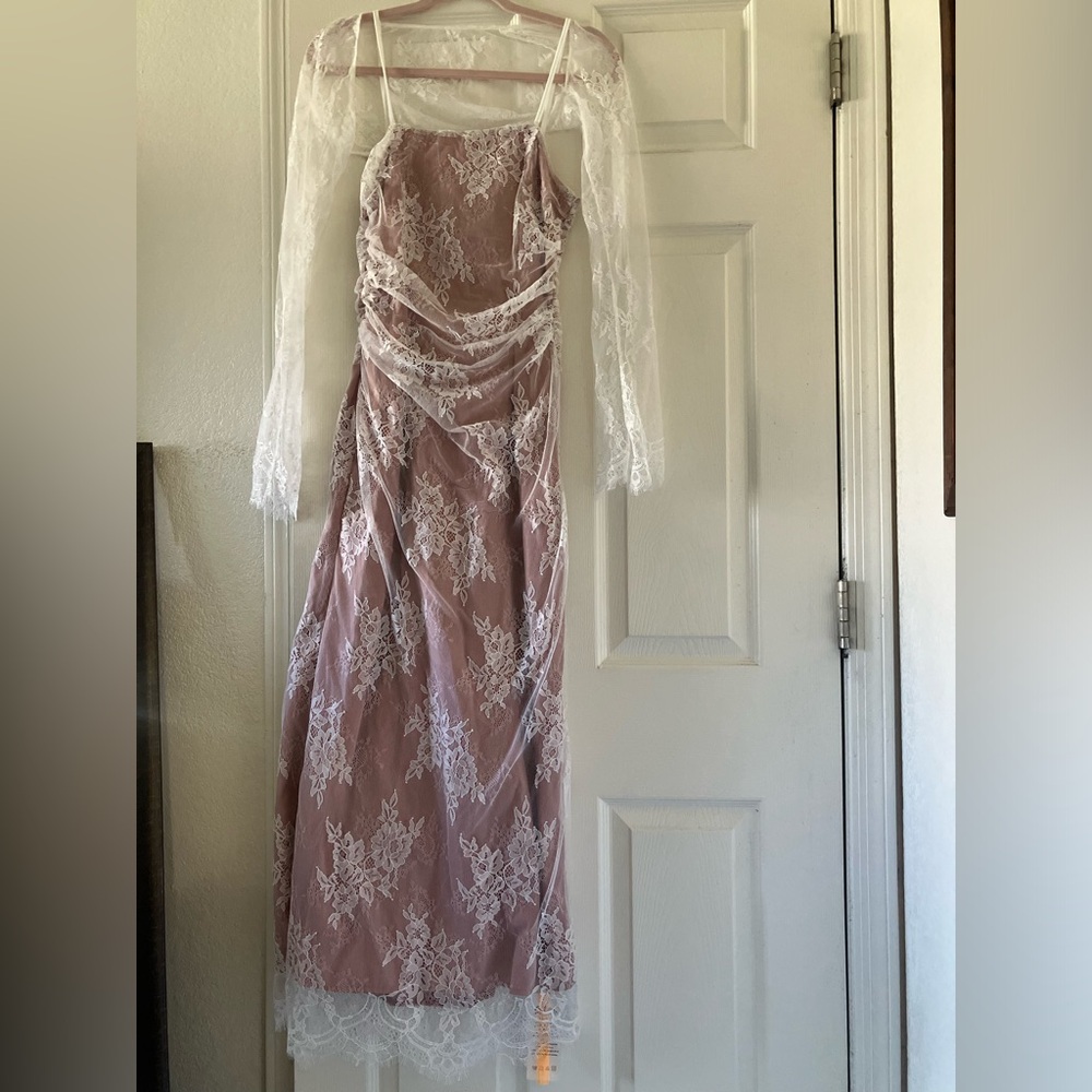 Sthcute pink dress with white lace overlay and sleeves. New with tags